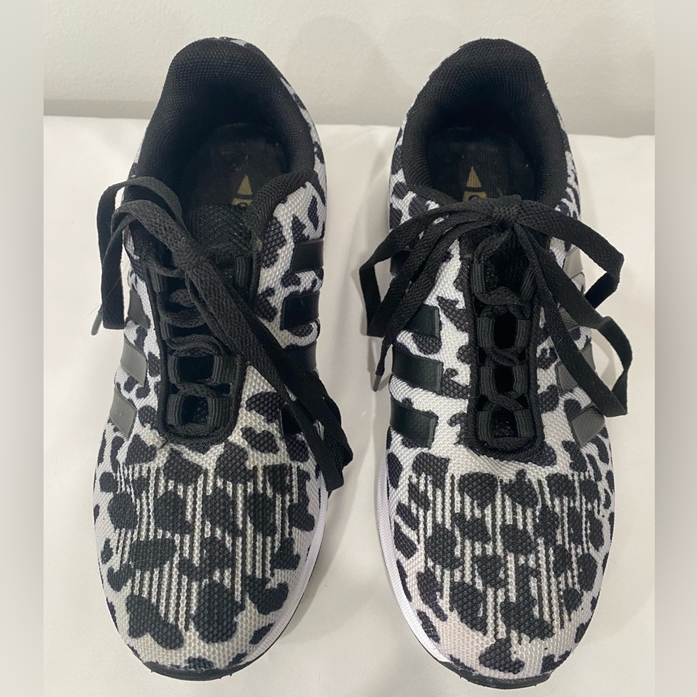 Oli Jolimall leopard print sneakers.